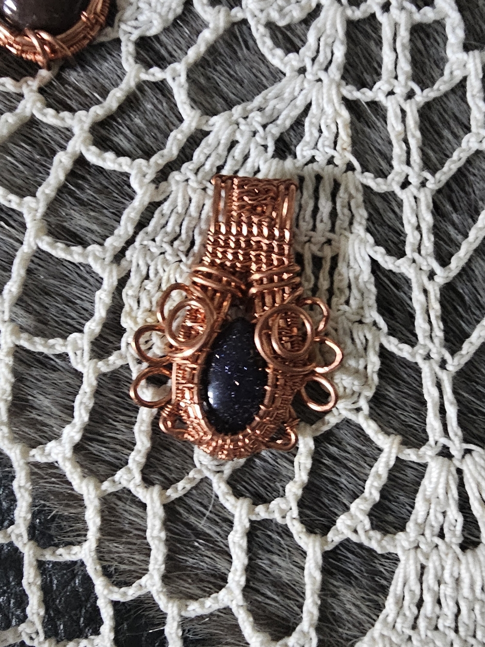 Handcrafted Copper Wire Wrapped Pendant with Blue Goldstone